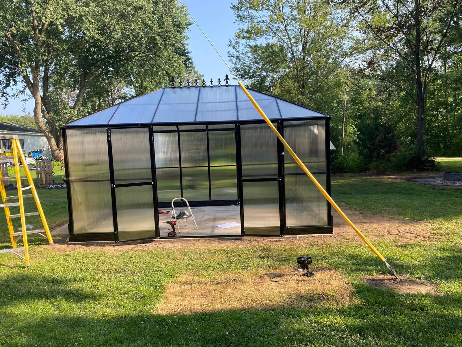 HOWE 16x12x9.5 FT Polycarbonate Greenhouse for Outdoors, Pavilion Style | Aluminum Greenhouse with 4 Vents & Lockable Double Doors, 6 FT Wall Height, Walk-in Sunroom, Ideal for Garden & Patio Use customer photo 1