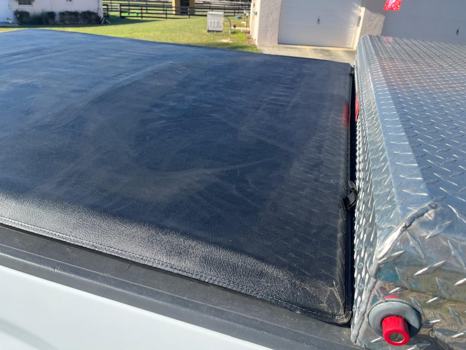 Amazon Basics Soft Roll-Up Truck Bed Tonneau Cover, 6.5 ft, Water-Resistant, Works with Bed Liners for 2014-2019 Chevy Silverado, GMC Sierra 1500, 2015-2018 Silverado Sierra 2500 3500 HD, Fleetside customer photo 1
