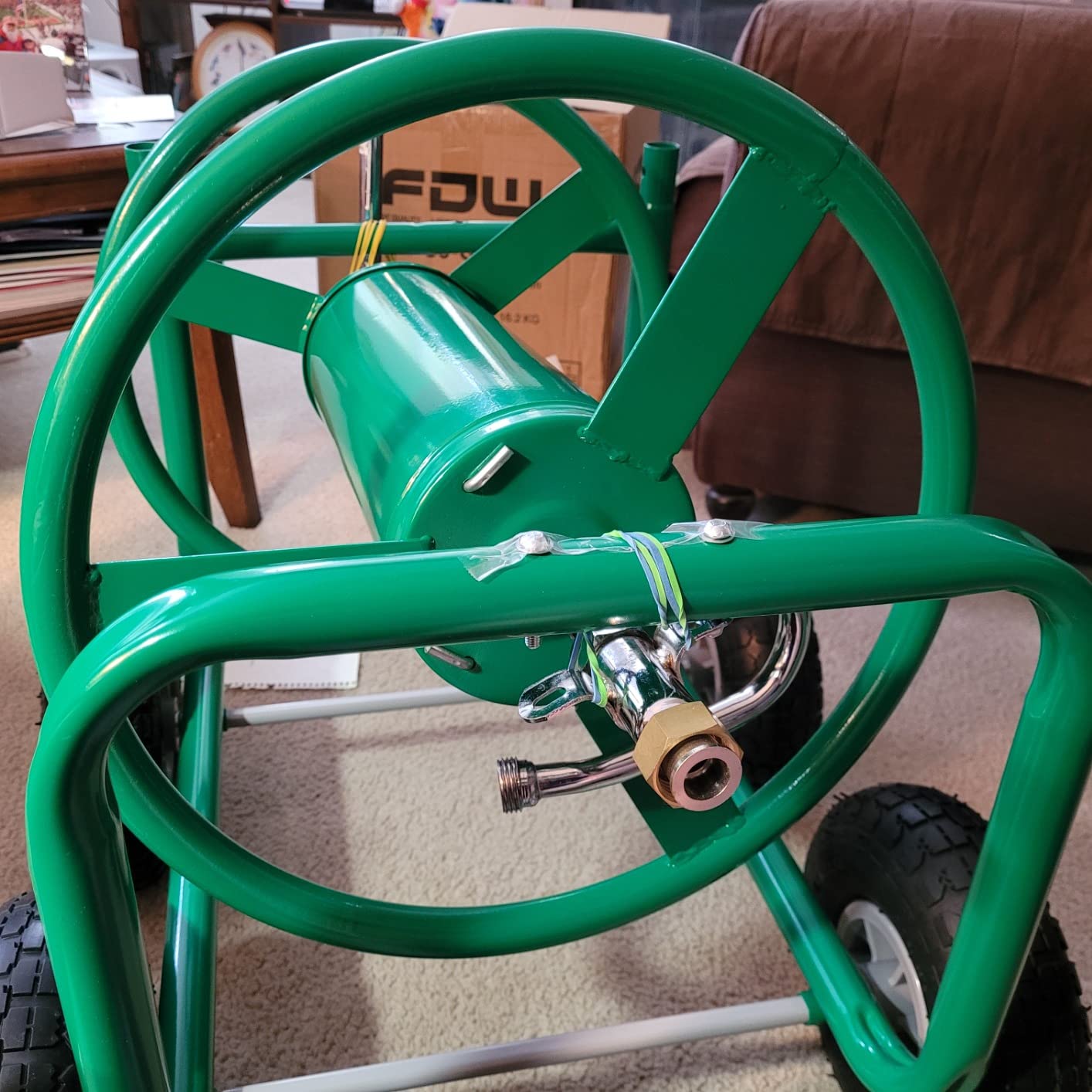 FDW Garden Hose Reel Cart, Water Hose Cart with 4 Wheels, Hold Up to 300 ft of 5/8’’ Hose，Heavy Duty Powder-Coated Steel Planting with Storage Basket, for Garden, Yard and Lawn customer photo 2