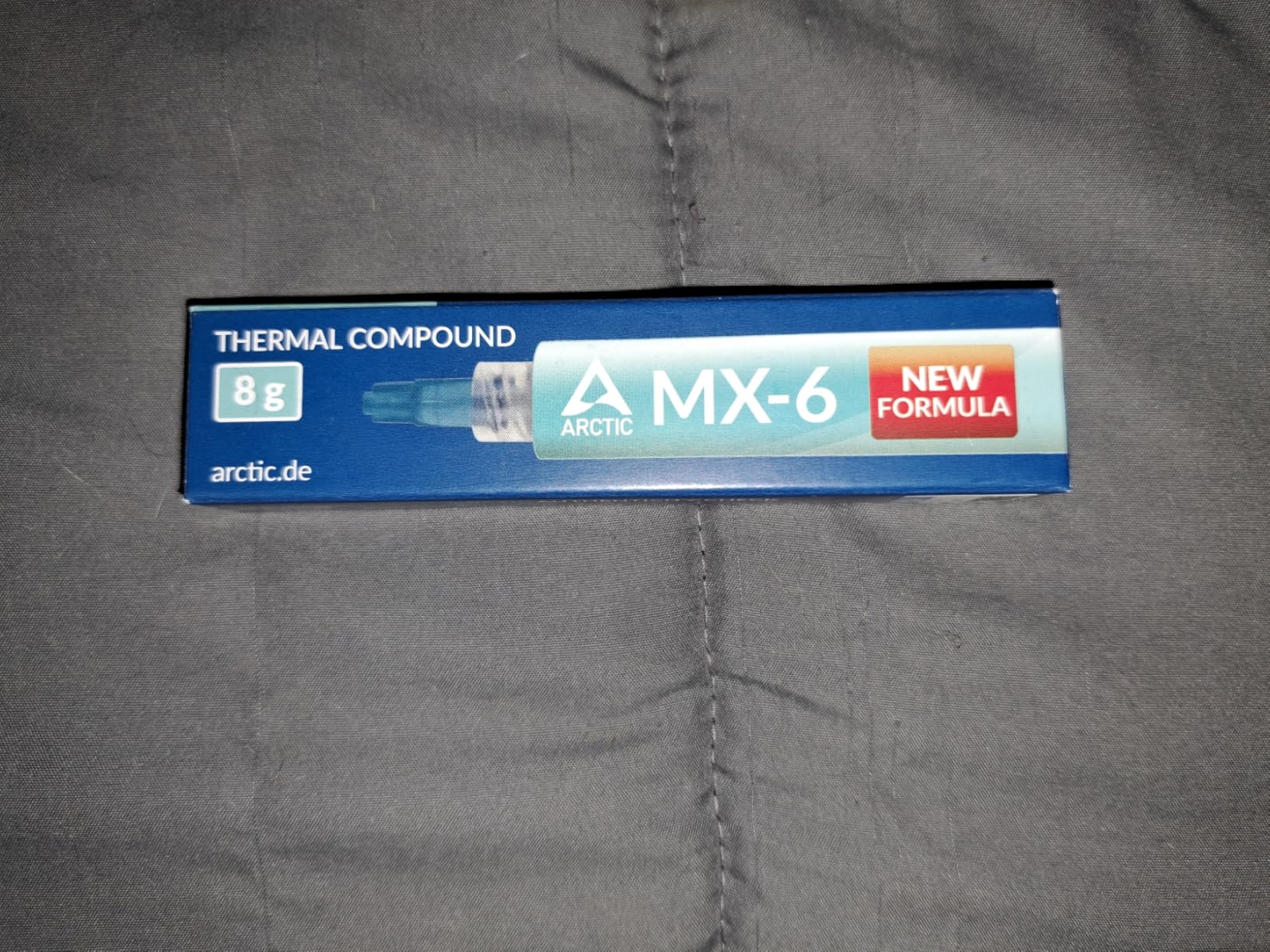 ARCTIC MX-6 (8 g) - Ultimate Performance Thermal Paste for CPU, Consoles, Graphics Cards, laptops, Very high Thermal Conductivity, Long Durability, Non-Conductive customer photo 1