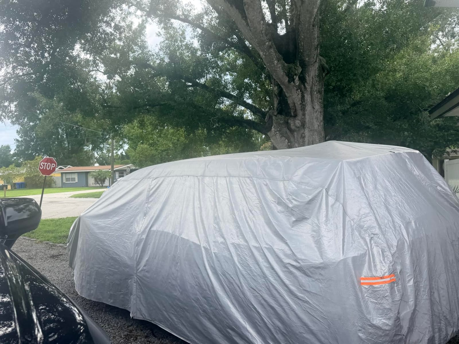 Kayme 6 Layers Waterproof Car Cover for Jeep Wrangler 4 Dr | Thick composite build, 100% waterproof PE-PEVA, reflective aluminum UV shield, inner cotton lining prevents paint scratches customer photo 1