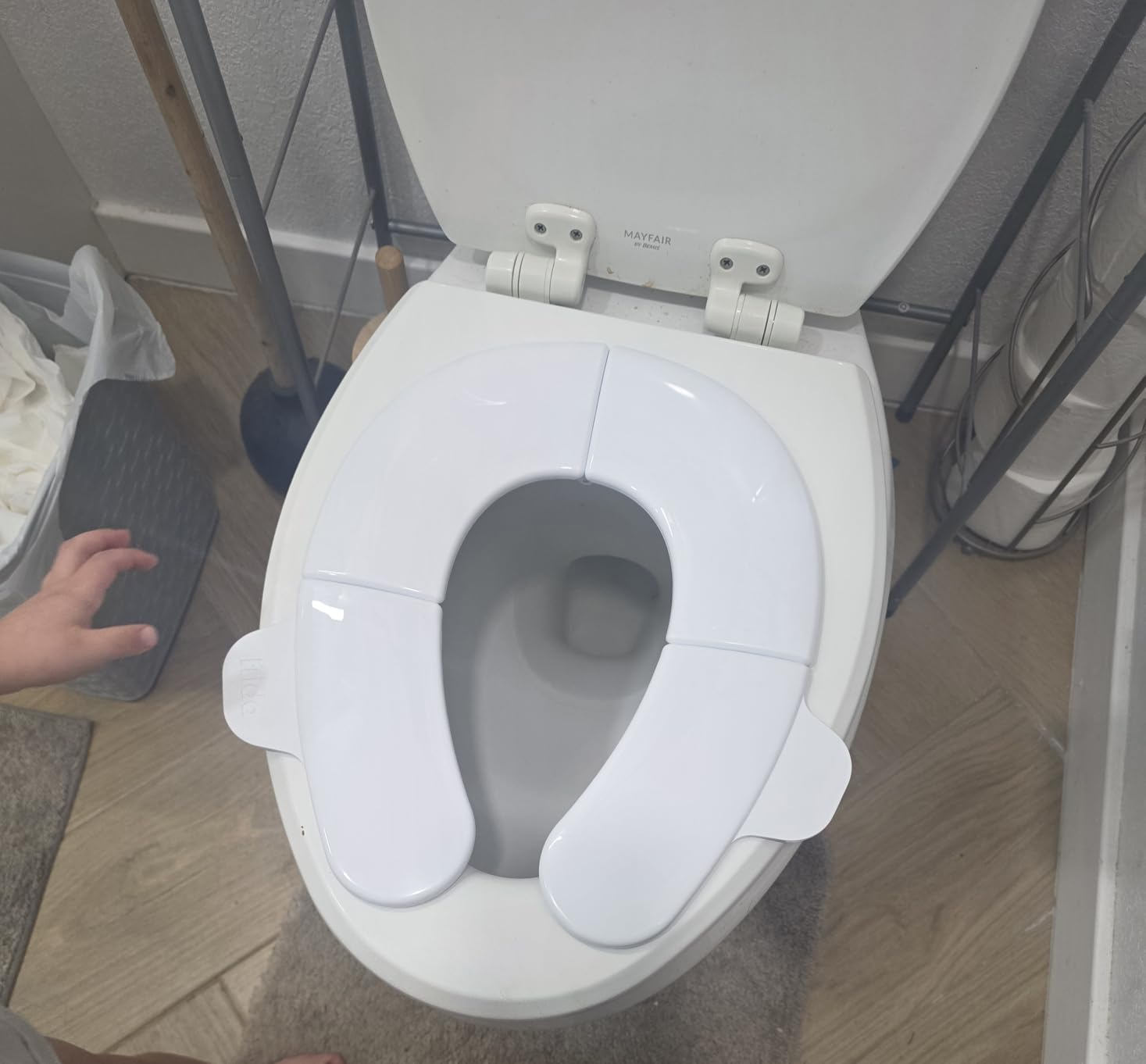 Frida Baby Fold-and-Go Portable Potty Seat for Toilet, Toddlers, Free Bag | Foldable Travel Potty Seat Fits Round & Oval Toilets, Non-Slip Base, Handles, Free Travel Bag customer photo 2