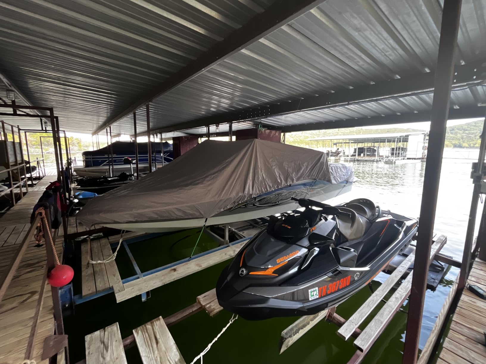 Solim 16'-18.5' Center Console Boat Cover, 1300D PU Waterproof Trailerable | Marine Grade Oxford Fabric, UV & Tear Resistant, Double Stitching, Elastic Hem, Adjustable Windproof Strap for Mooring/Storage customer photo 1