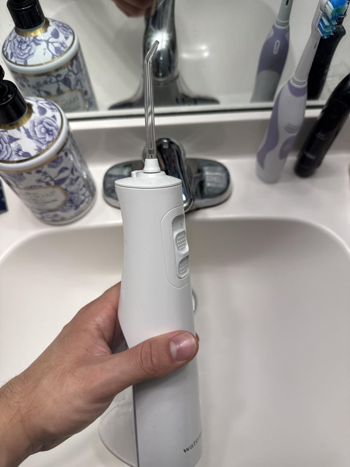 Waterpik Cordless Pulse 3100 Portable Water Flosser, Rechargeable, Blue | 2 Settings, 1 Precision Tip & 1 Tongue Cleaner Tip for Fresh Breath, Travel, Shower Use, ADA Accepted, WF-20 Amazon Exclusive customer photo 2