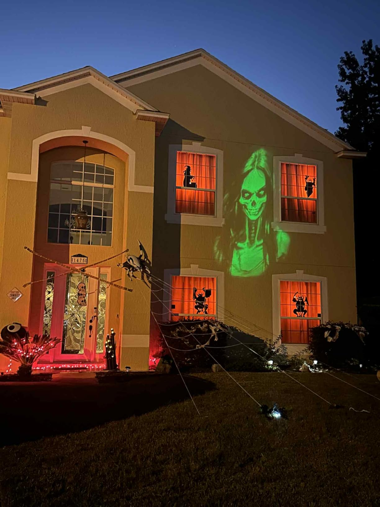 Halloween Projector Outdoor, 2026 Upgraded 3D Dynamic Skull HD Patterns, Clearer Holiday Light Ideal for Window Wall Displays and Halloween Garage Door Cover Projections customer photo 1