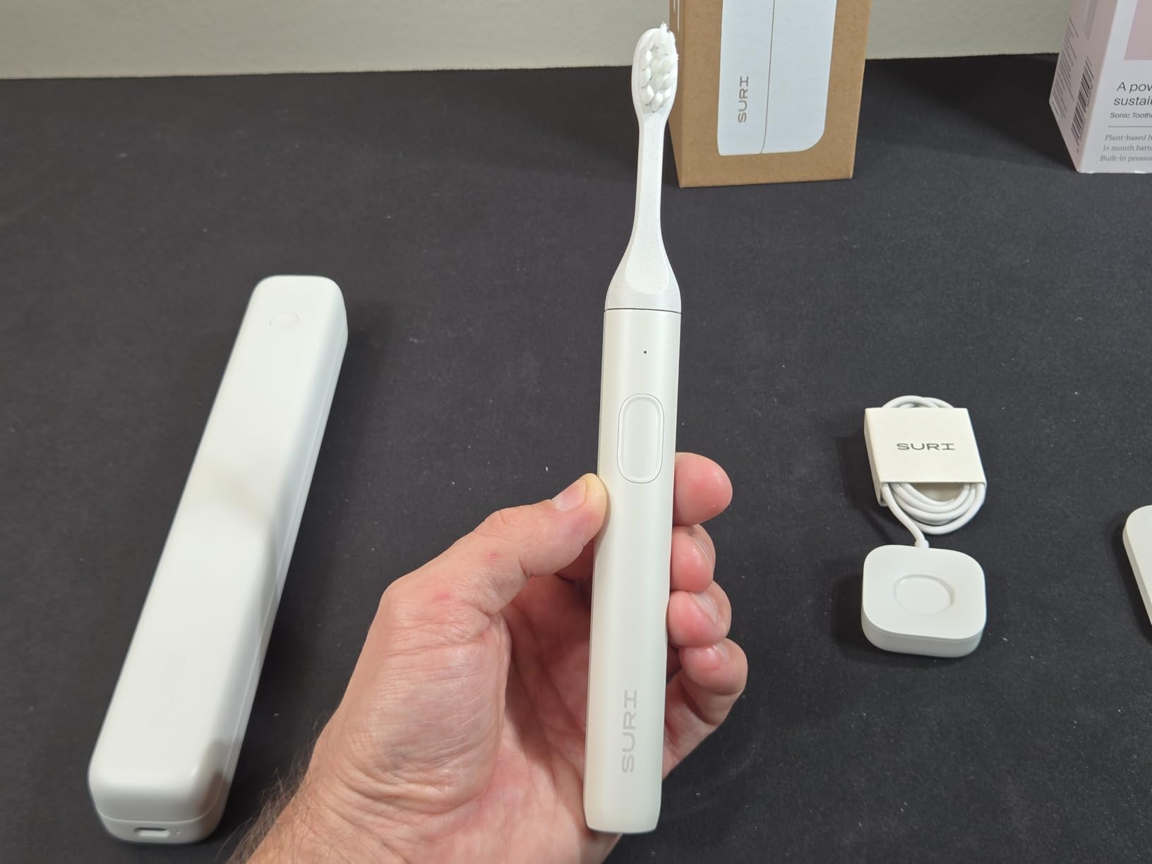SURI Pro Sonic Electric Toothbrush | Over 4+ Weeks Battery | UV Cleaning Travel Case | Pressure Sensor | Aluminium Body | 2-Minute Timer | Plant-Based Head | Green customer photo 2
