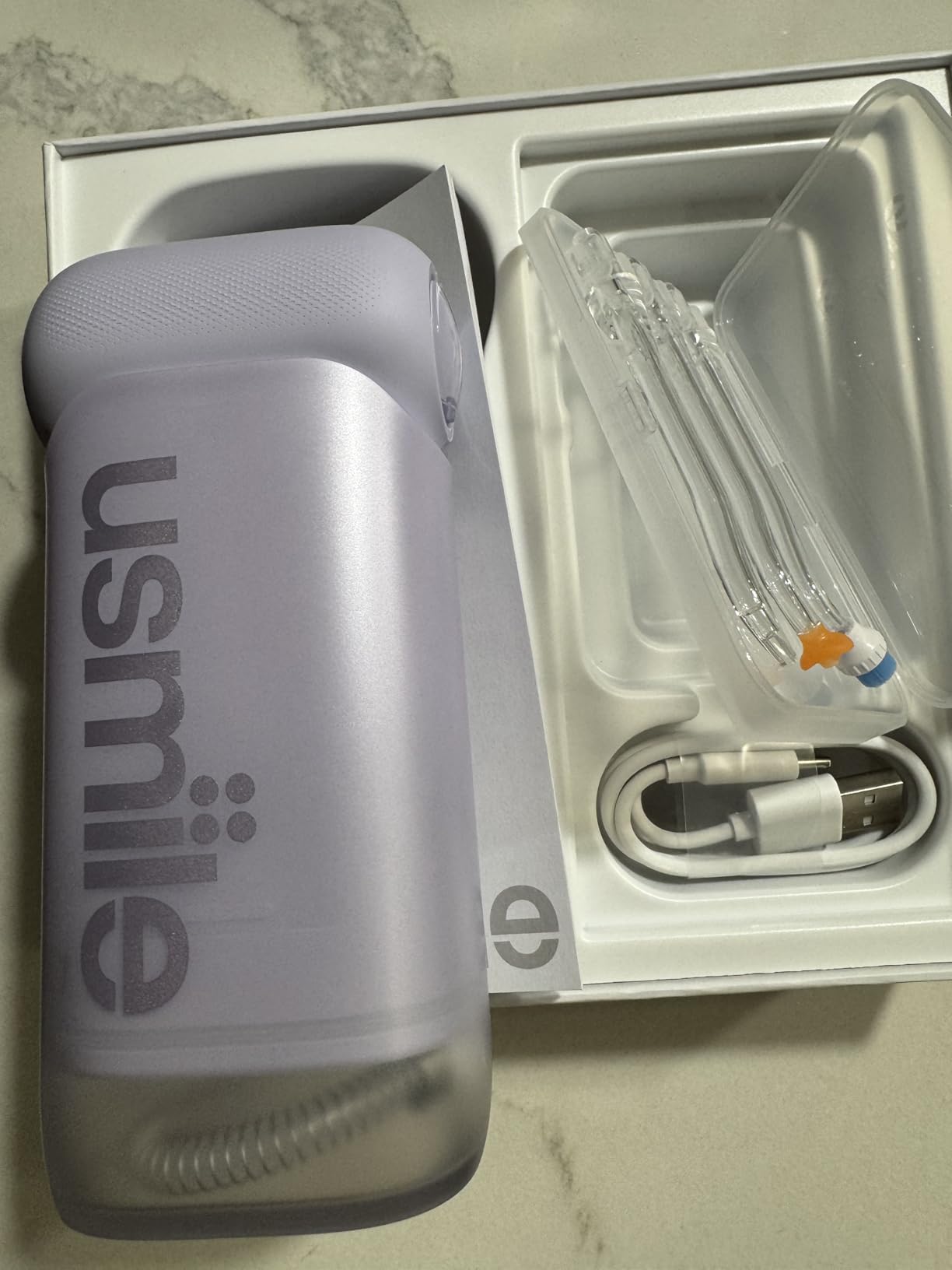 usmile C10 Portable Water Flosser for Travel, 95-Day Battery, IPX7, Purple | 180ml Tank, 4 Modes, 360° Nozzle, Cordless Oral Irrigator for Braces, Implants & Sensitive Teeth, Teeth Cleaner customer photo 1